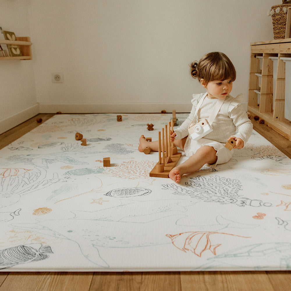 bébé sur le tapis de jeu xl le coquillage motif animaux de la mer