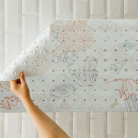 tapis de bain bubulle avec vue des ventouses