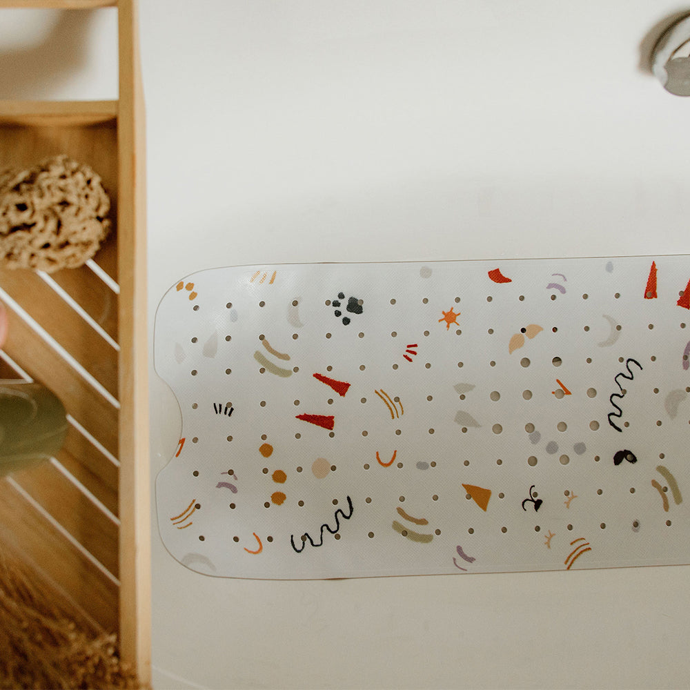 tapis de bain méli-mélo dans la baignoire