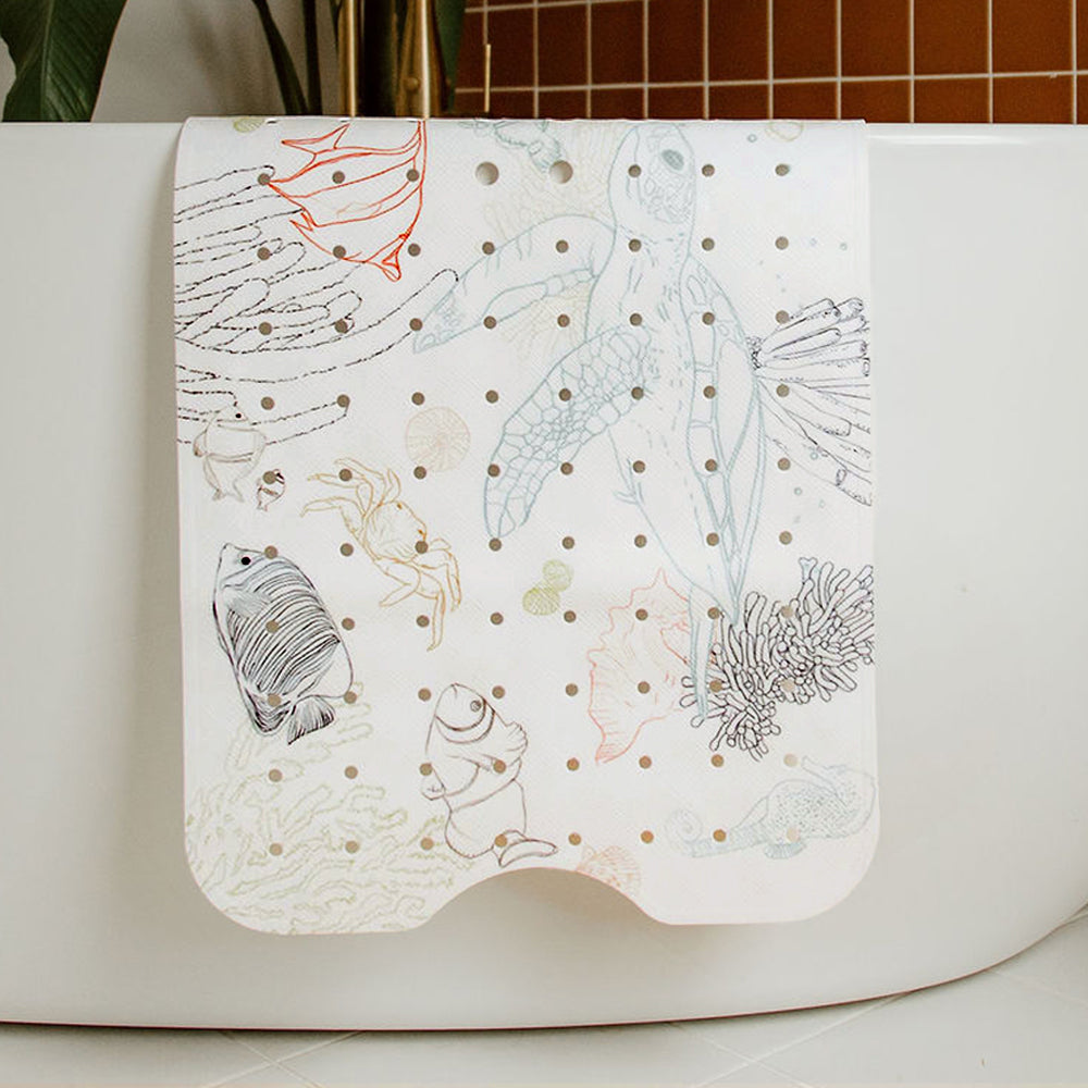 tapis de bain "bubulle" exposé sur la baignoire