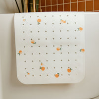 tapis de bain pêche exposé sur la baignoire