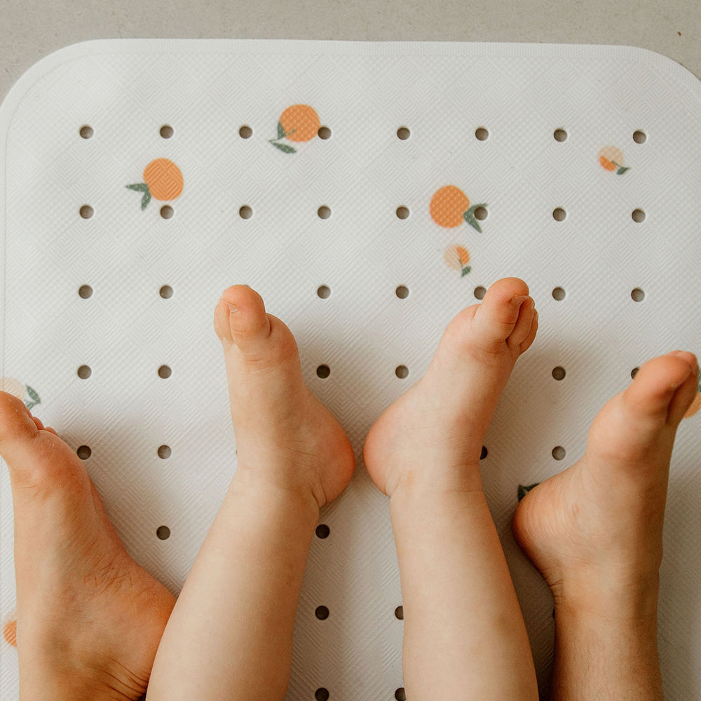 zoom motif tapis de bain le peche