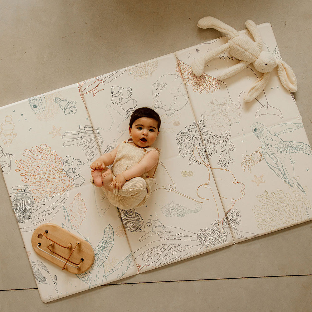 bebe sur le tapilou pliable animaux de la mer bubulle