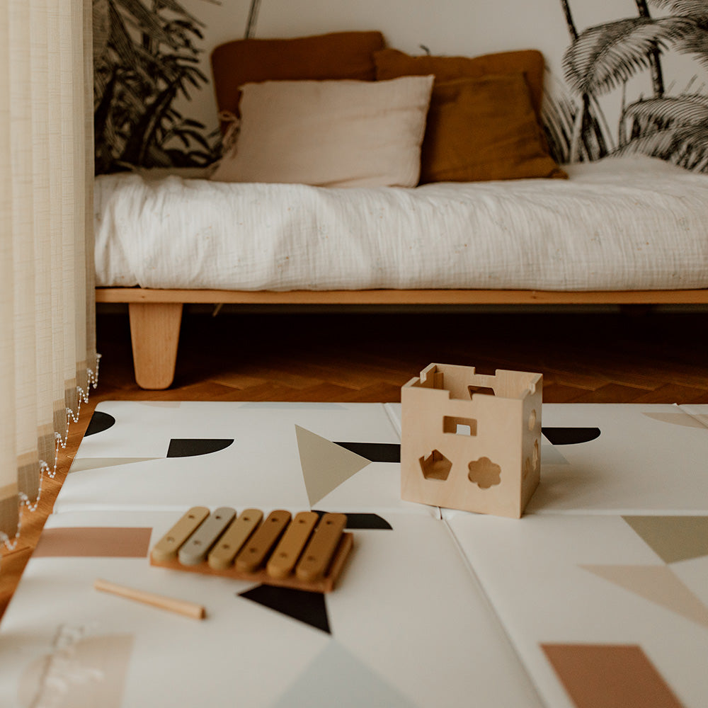 tapis de jeu motif géométrique savana